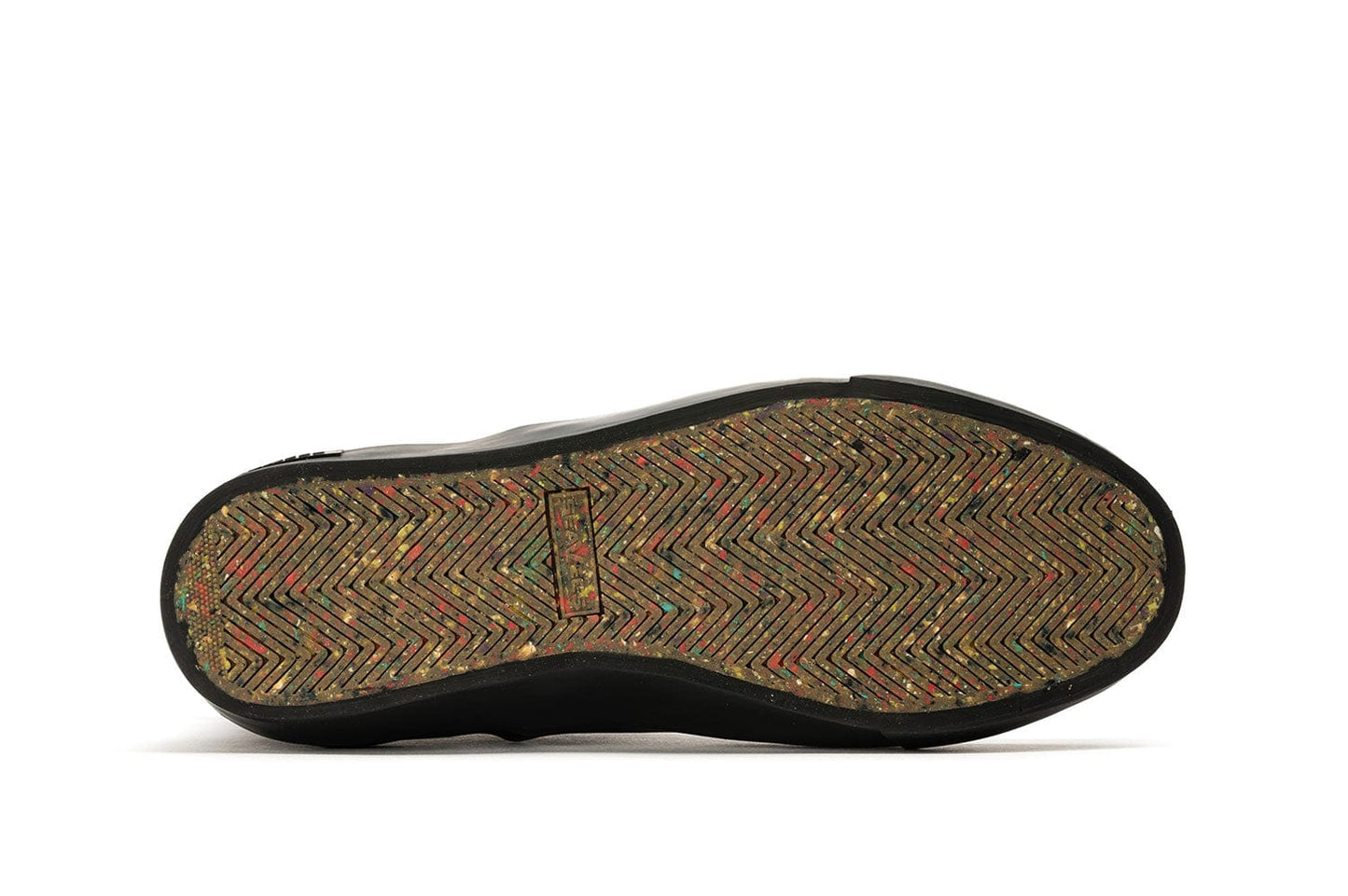 Sole of Beyond & Back Boot in Black Olive on white backdrop.
