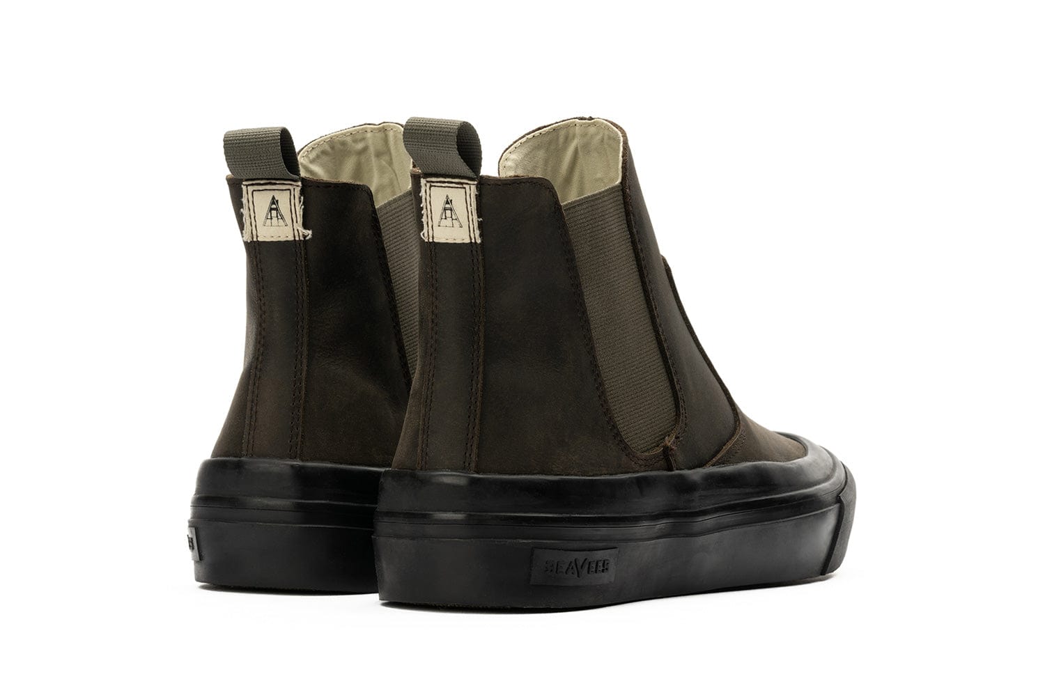 Rear view of Beyond & Back Boot in Black Olive on white backdrop.