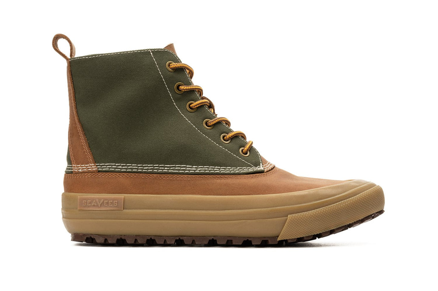 Side profile of Cascade Range boot in Cashew/Olive with contrast stitching and looped pull tab, against a neutral background.