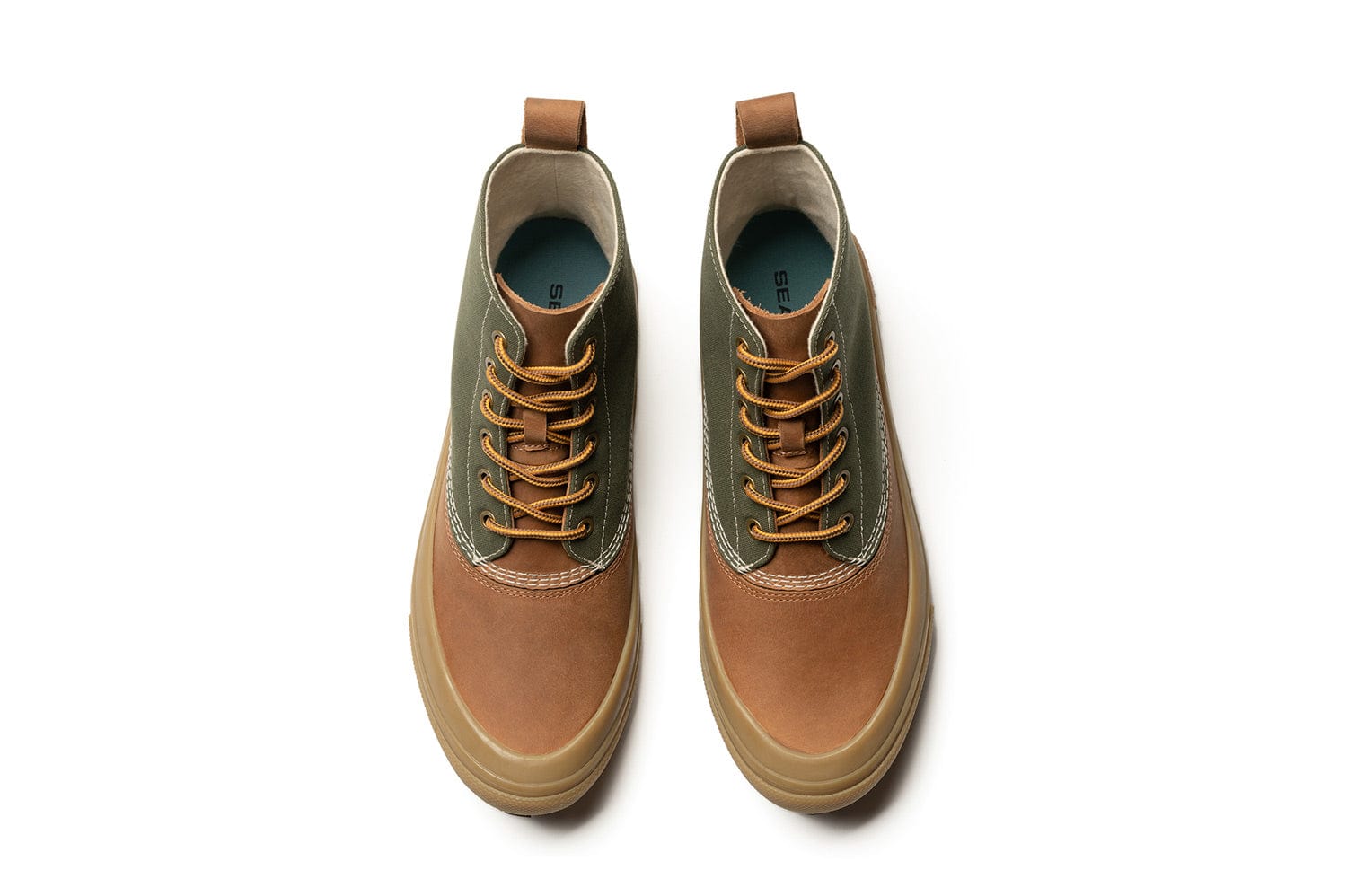 Top view of Cascade Range boots in Cashew/Olive, highlighting the contrast of olive canvas and cashew leather.