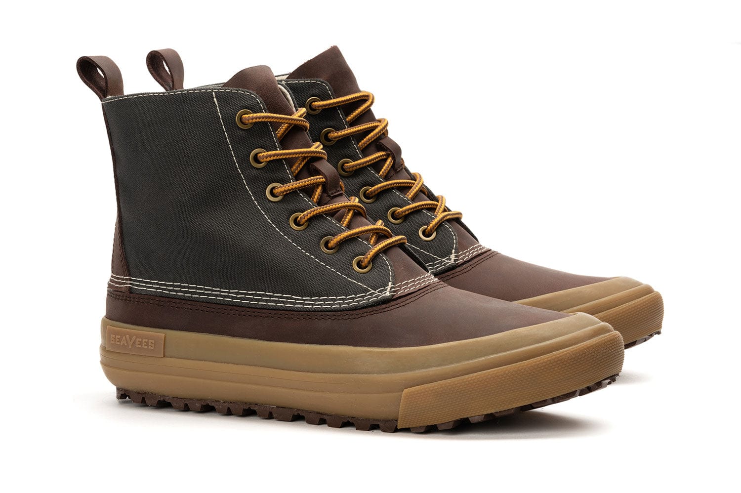 Angled view of Hickory/Charcoal Cascade Range Boots showing off the high-top style and sturdy brown soles.