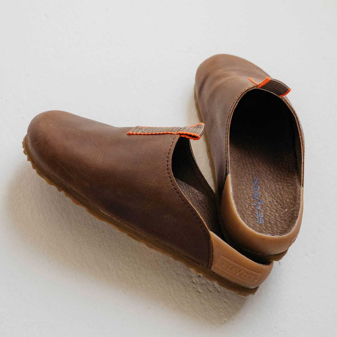 Men's Tiburon Trekker sandal in Elmwood leather, pair shown on a white background, one showing the insole