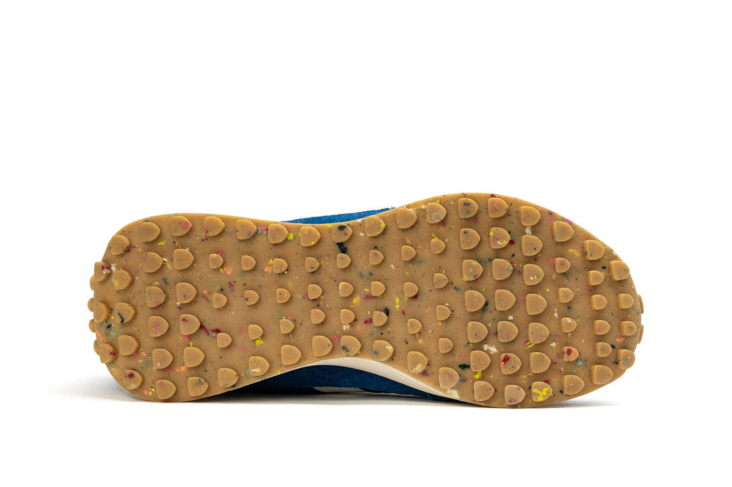 A detailed photo of the sole of the Acorn Trainer sneaker, showcasing recycled materials.