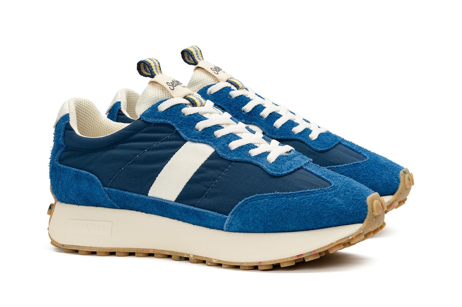 A pair of SeaVees 'Acorn' sneakers in Varsity Blue color, angled to show the outer sides of the shoes.