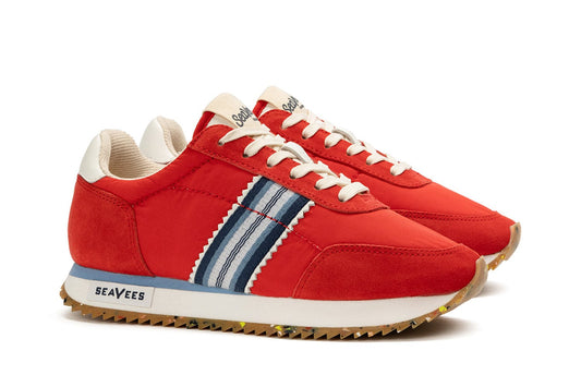 Angled view of Royal Runner sneakers in Strawberry, featuring SeaVees on sole and tongue and recycled bottom.