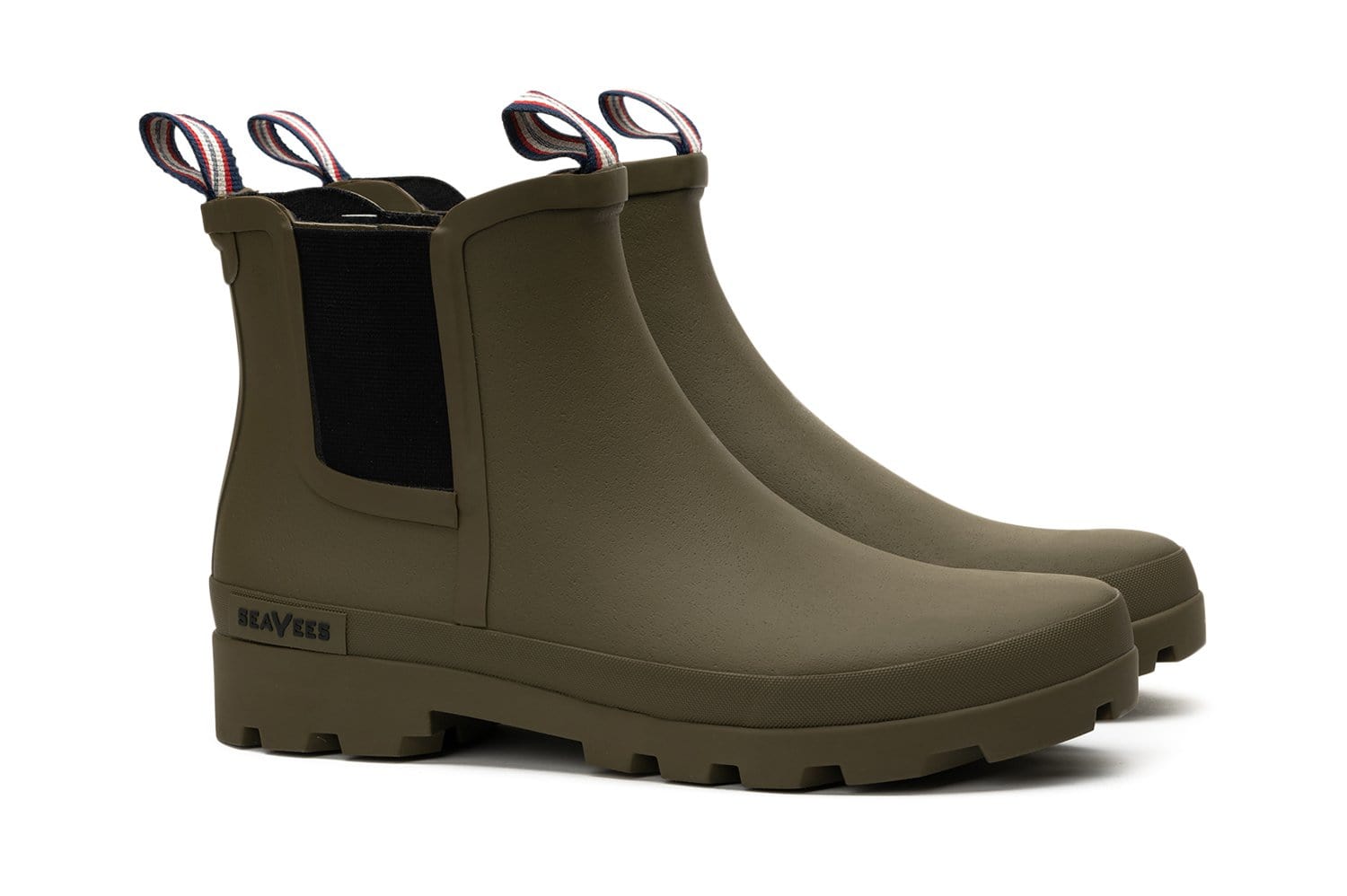 Angled view of Bolinas Off Shore Boot in Military Olive, showing side panels and tab.