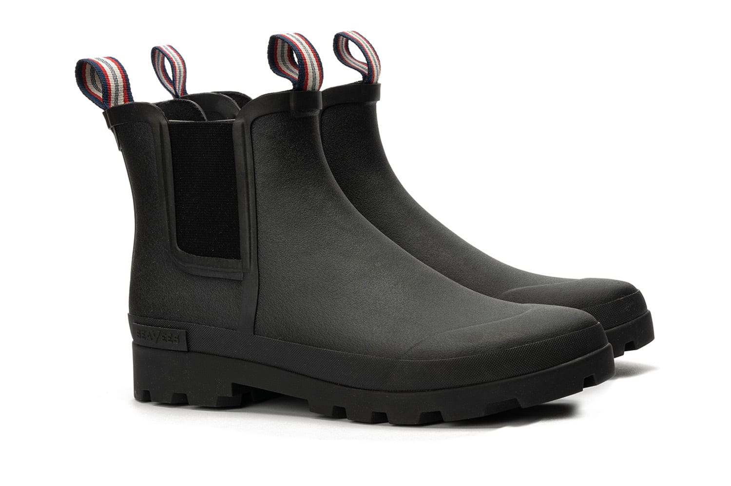 Angle view of the Bolinas Off Shore Boot in Black showing elastic sides and sturdy sole.