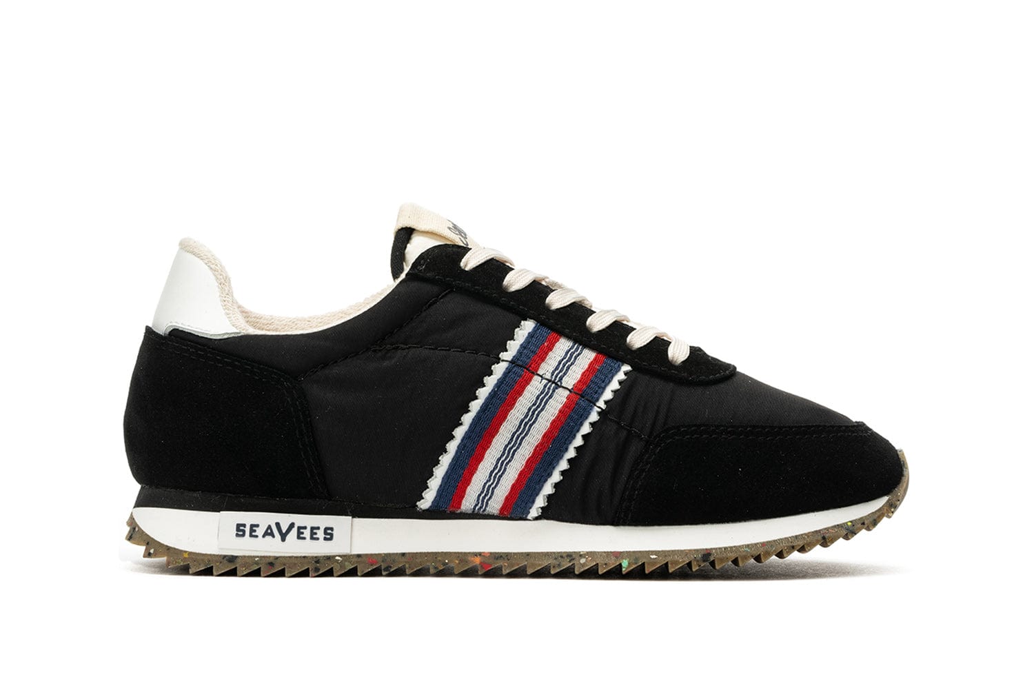 Side view of Royal Runner sneaker in Black featuring SeaVees logo and recycled bottom.